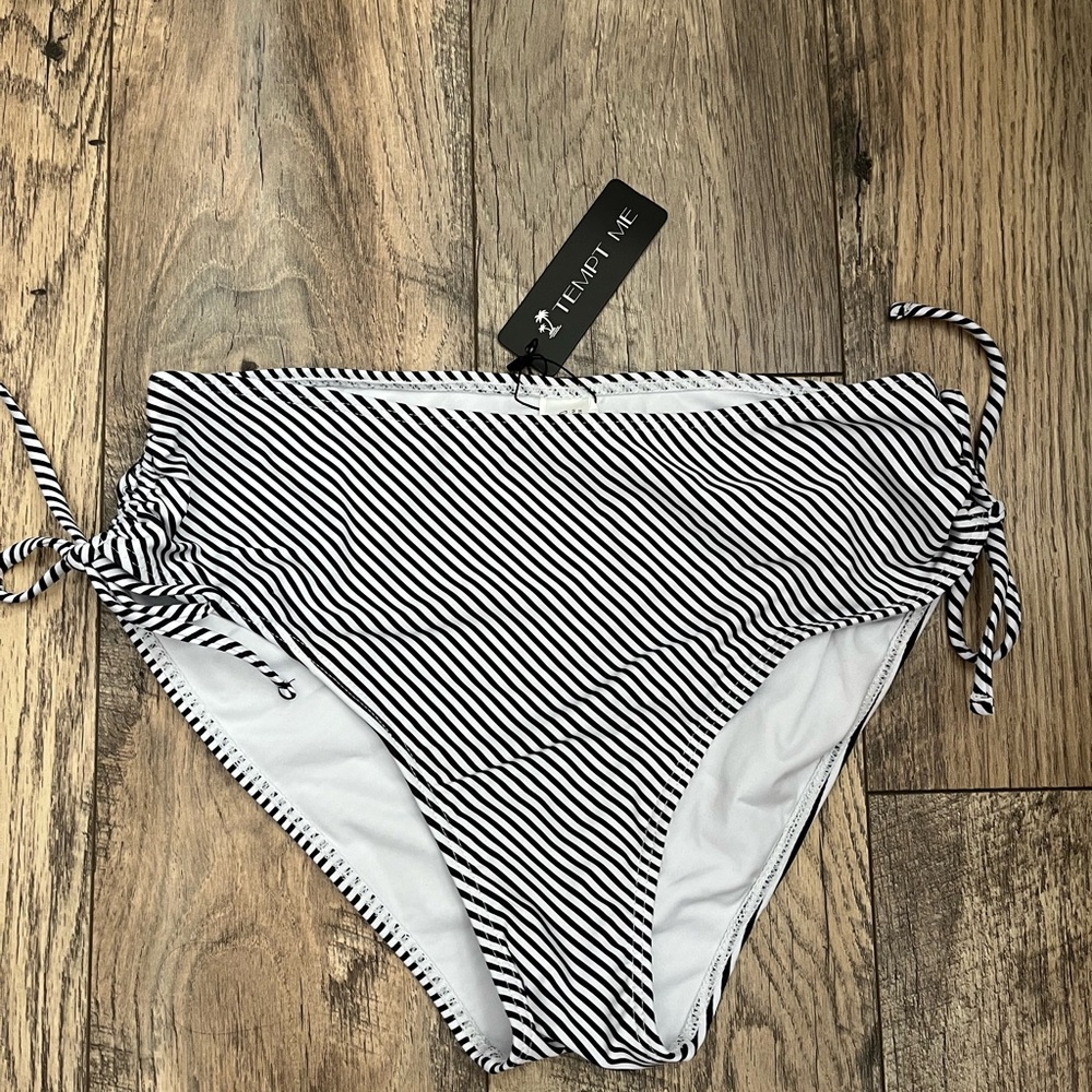 New with tags tempt me bikini bottom size medium. Stripes.